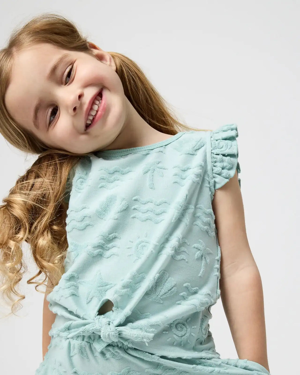 Coastal Rays Bow Front Flutter Top
