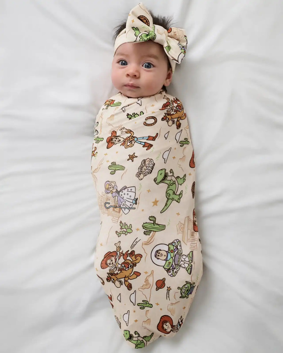 Disney & Pixar Woody's Wild West Swaddle & Luxe Bow Headband Set
